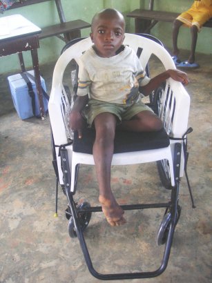 A child gets a wheelchair too