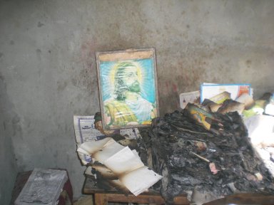 Picture of Jesus in burnt out home of Christians in Pakistan