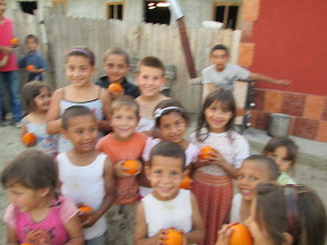 cheerful orphans who have received a fruit