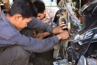 motorcycle workshop in Cambodia