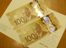 colourful Canadian money 2 $100 bills